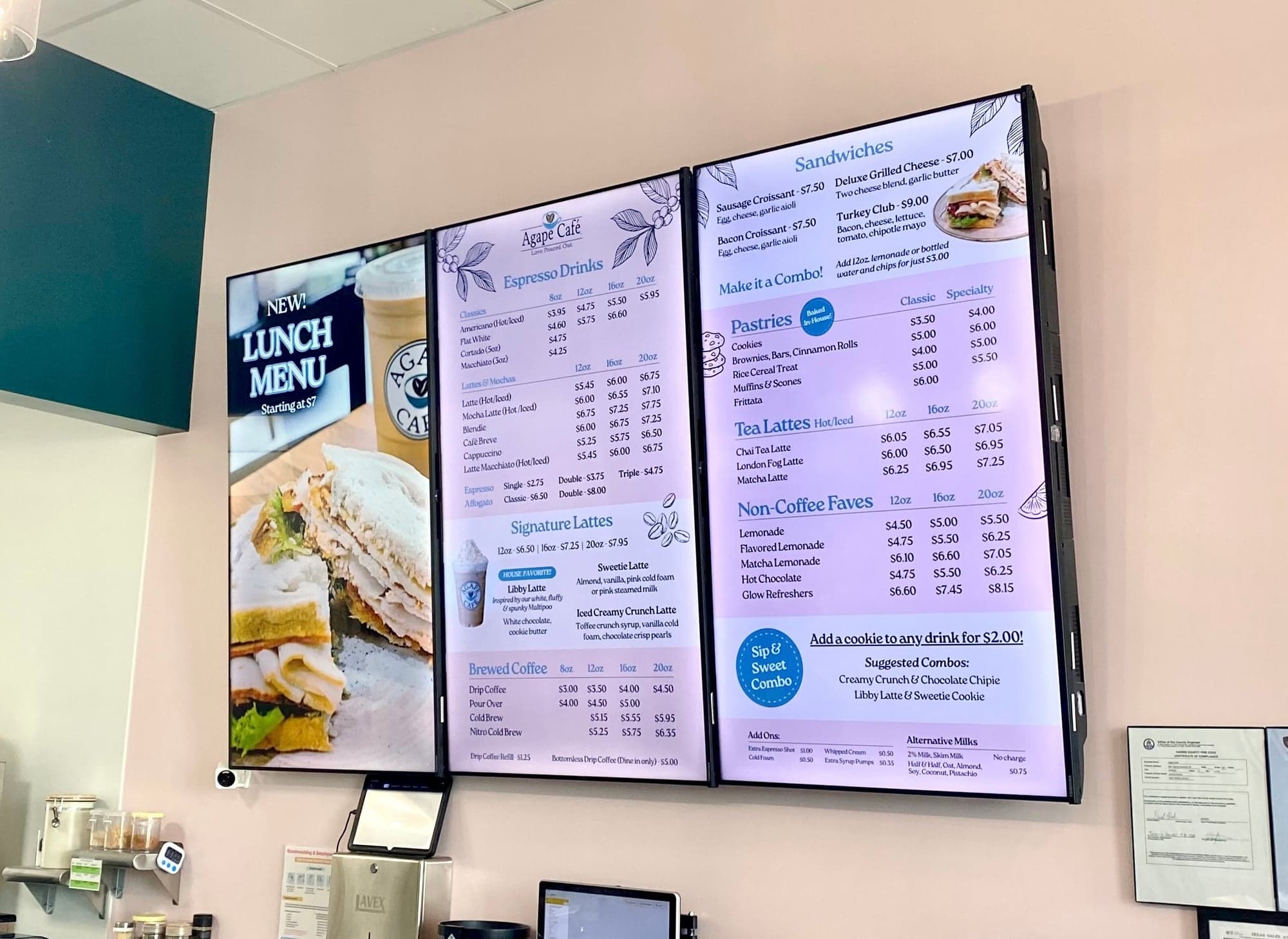 Agape Café three-screen digital menu system installed behind the counter