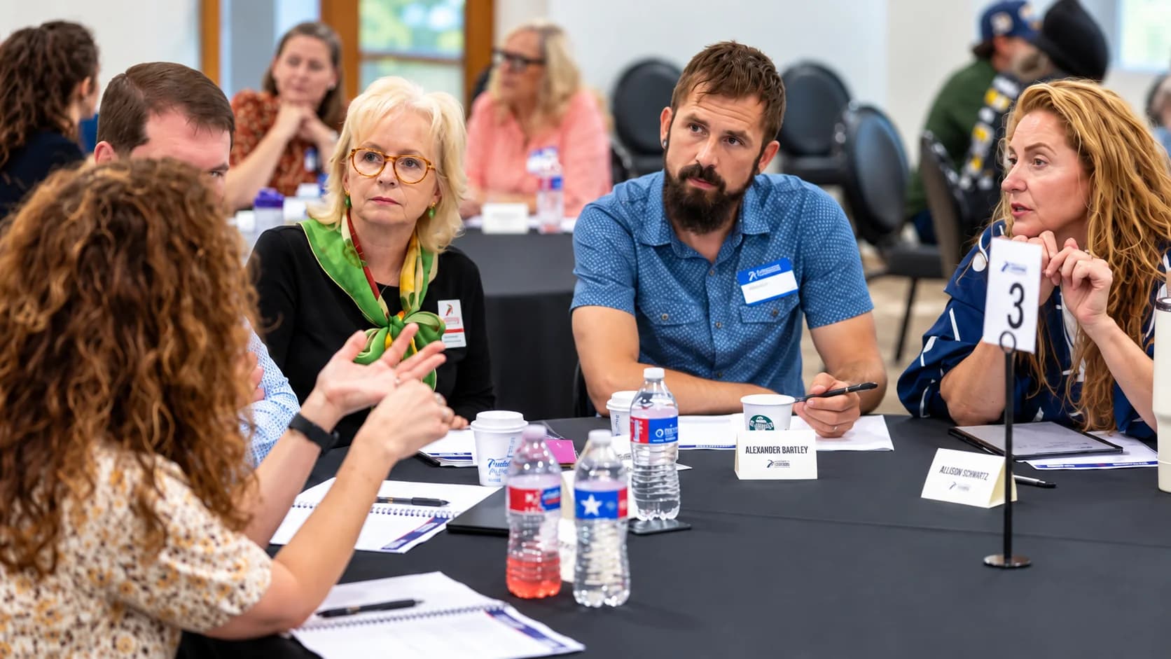 Alexander Gartley listening during a small-business roundtable discussion at the Greater EMC Chamber Business Solutions Lab